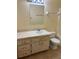 Bathroom featuring a vanity with marble effect counter, drawers, and toilet at 3700 Washington St, Sanford, FL 32771
