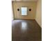 Empty bedroom with tile flooring, and a window providing natural light at 3700 Washington St, Sanford, FL 32771