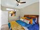 Comfortable bedroom featuring colorful décor and a ceiling fan at 533 Quail Down Dr, Debary, FL 32713