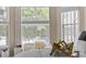 Bright bedroom with large windows offering scenic views and modern decor at 533 Quail Down Dr, Debary, FL 32713