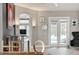 Inviting open living area with decor and views of the screened in pool at 533 Quail Down Dr, Debary, FL 32713
