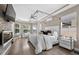 Luxurious main bedroom features a modern fireplace and large windows at 533 Quail Down Dr, Debary, FL 32713