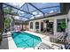 Comfortable outdoor lounge area by pool at 533 Quail Down Dr, Debary, FL 32713