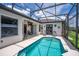 Beautiful screened-in pool and patio with a TV at 533 Quail Down Dr, Debary, FL 32713