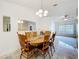 Spacious dining area with tile floors and a neutral color palette at 5409 Holtland Dr, Apopka, FL 32712