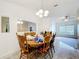 Spacious dining area with tile floors and a neutral color palette at 5409 Holtland Dr, Apopka, FL 32712