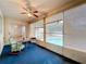 A screened-in Florida room with view of the outdoor pool at 5409 Holtland Dr, Apopka, FL 32712