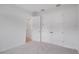 Bedroom with neutral carpet, closet and doorway at 5908 Sw 115 Street Rd, Ocala, FL 34476