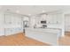 Modern kitchen boasts stainless steel appliances and a large center island at 5908 Sw 115 Street Rd, Ocala, FL 34476