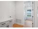 Bright laundry room with washer and dryer hookups at 5908 Sw 115 Street Rd, Ocala, FL 34476
