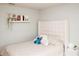 Comfortable bedroom featuring a padded headboard, and fun decor at 5963 Glory Bower Dr, Winter Garden, FL 34787