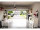 Open garage with brick-paved driveway and ample storage space at 5963 Glory Bower Dr, Winter Garden, FL 34787