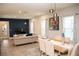 Stylish living room and dining area with modern furnishings and elegant decor at 5963 Glory Bower Dr, Winter Garden, FL 34787
