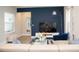 Comfortable living room with contemporary furnishings, bright accents, and stylish decor at 5963 Glory Bower Dr, Winter Garden, FL 34787