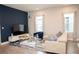 Comfortable living room with contemporary furnishings, bright accents, and stylish decor at 5963 Glory Bower Dr, Winter Garden, FL 34787