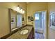 Bathroom featuring a vanity with granite countertops and a tub/shower combo at 604 Timberwilde Ct, Winter Springs, FL 32708