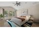 Comfortable bedroom with vaulted ceiling, neutral tones, and carpeted floor at 6874 Slaven Dr, Orlando, FL 32819