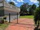 Fenced backyard, featuring well-maintained grass and a brick pathway at 714 Springdale Rd, Orlando, FL 32804