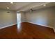 Spacious bedroom with ceiling fan, new flooring, and view of ensuite bath at 714 Springdale Rd, Orlando, FL 32804