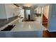 This kitchen features white cabinets, countertop space and updated appliances at 714 Springdale Rd, Orlando, FL 32804
