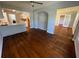 Living room features new flooring and open access to the renovated kitchen at 714 Springdale Rd, Orlando, FL 32804