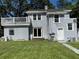 Charming home featuring a backyard, outdoor deck, and sliding glass door for access to the home at 714 Springdale Rd, Orlando, FL 32804