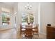 Charming breakfast nook with views of the screened-in pool and outdoor space at 748 Mills Estate Pl, Chuluota, FL 32766