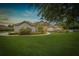 Spacious front yard showcases a single story home with stone accents and beautiful landscaping at 748 Mills Estate Pl, Chuluota, FL 32766