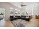 A spacious living room with large windows and luxury furnishings at 748 Mills Estate Pl, Chuluota, FL 32766