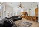 Spacious living room leads to an open kitchen with lots of natural light at 748 Mills Estate Pl, Chuluota, FL 32766