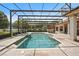 Resort-style screened pool with spa and ample seating, perfect for entertaining at 748 Mills Estate Pl, Chuluota, FL 32766