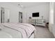Neutral bedroom featuring carpet flooring and modern furnishings at 923 Colie Aly, Winter Garden, FL 34787