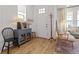 Bright entryway with hardwood floors, natural light, and stylish decor at 923 Colie Aly, Winter Garden, FL 34787