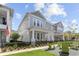 Charming two-story home with a spacious front yard and welcoming front porch at 923 Colie Aly, Winter Garden, FL 34787