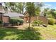 A cozy backyard featuring a neat garden and peaceful seating area, perfect for relaxing outdoors at 940 Douglas Ave # 159, Altamonte Springs, FL 32714