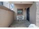 Inviting home entrance with a quaint seating area, offering a warm welcome and pleasant curb appeal at 940 Douglas Ave # 159, Altamonte Springs, FL 32714
