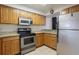 Practical kitchen layout with updated appliances and ample counter space at 940 Douglas Ave # 159, Altamonte Springs, FL 32714