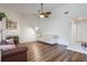 Bright living room features hardwood floors and fireplace with stylish decor at 940 Douglas Ave # 159, Altamonte Springs, FL 32714