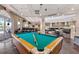 Features a pool table, tables and chairs, and decor at 109 Cambria Ave, Davenport, FL 33897