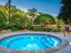 Inviting community hot tub nestled amongst lush landscaping at 109 Cambria Ave, Davenport, FL 33897