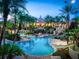 Enjoy the inviting community lazy river and water features by the clubhouse at 109 Cambria Ave, Davenport, FL 33897