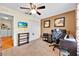 An office with a desk, computer, and office chair at 109 Cambria Ave, Davenport, FL 33897