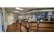 View of the reception area features a front desk, multiple TVs, and themed decor at 109 Cambria Ave, Davenport, FL 33897