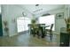 Bright dining area with stylish furniture and plenty of natural light at 11761 Hatcher Cir, Orlando, FL 32824