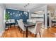 Elegant dining room featuring wood floors and a view to the kitchen at 1219 Oakley St, Orlando, FL 32806