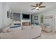 Comfortable living room with a fireplace and neutral decor at 1219 Oakley St, Orlando, FL 32806