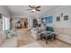 Bright living area featuring tile floors and open access to dining at 1219 Oakley St, Orlando, FL 32806