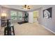 This bonus room features a ceiling fan, a treadmill, and a small bar at 127 Heatherbrooke Cir, Oviedo, FL 32765