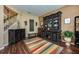 Inviting sitting room featuring decorative furnishing and a decorative area rug at 127 Heatherbrooke Cir, Oviedo, FL 32765