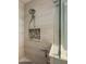 Modern tiled shower features built in shower head and design features at 127 Heatherbrooke Cir, Oviedo, FL 32765